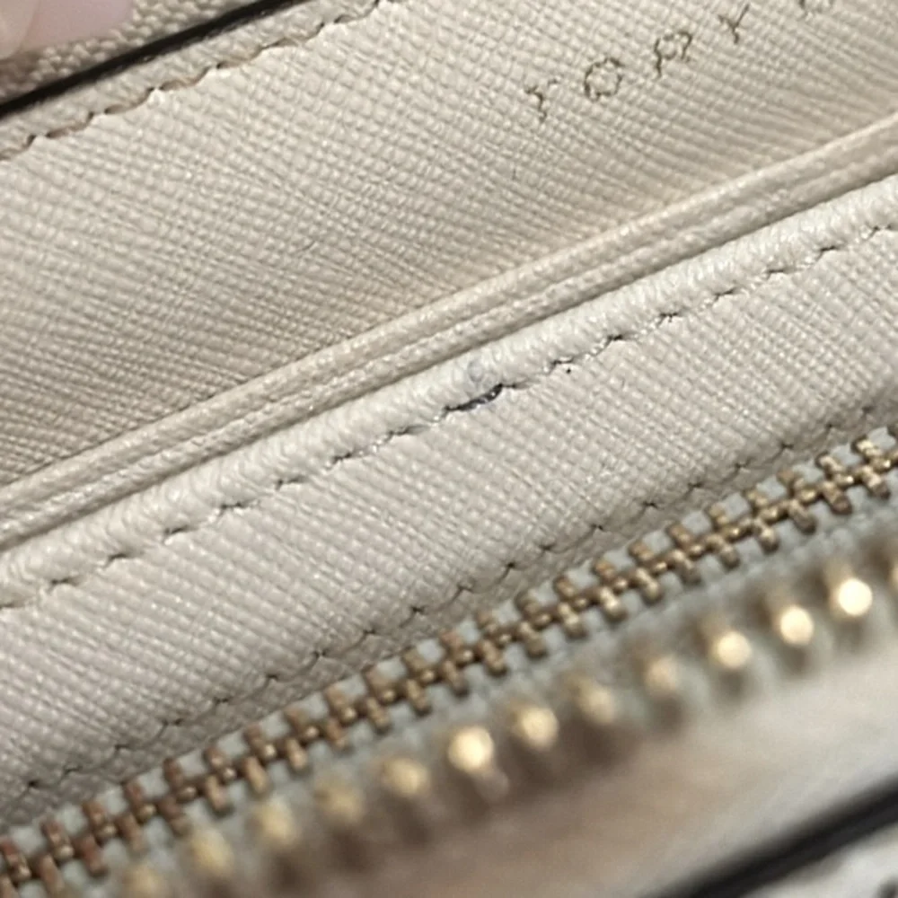 Tory Burch Beige Diamond Laser Cut Leather Zip Around Wallet cream and blue